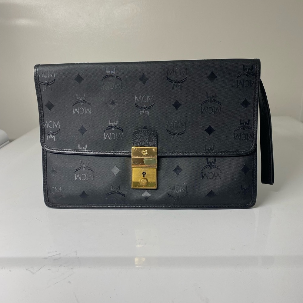MCM men’s wristlet bag. Can be carried as woman’s purse. Vintage
